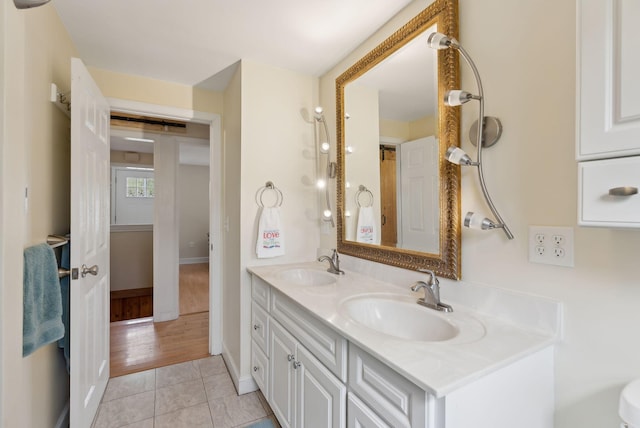 48 Woodside Dr, Kennebunk, ME 04043 - full bath featuring tile patterned flooring, double vanity, and baseboards