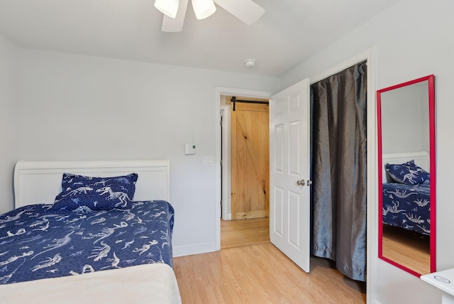 48 Woodside Dr, Kennebunk, ME 04043 - bedroom featuring wood finished floors, baseboards, and a ceiling fan