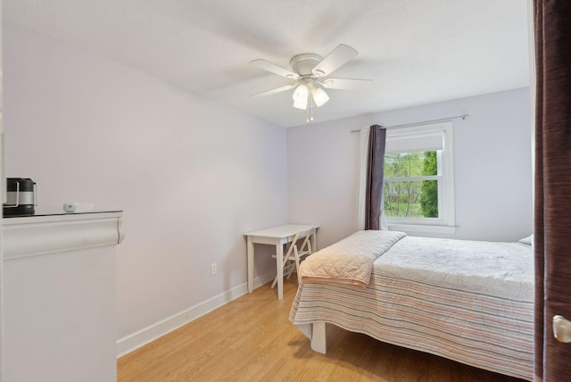 48 Woodside Dr, Kennebunk, ME 04043 - bedroom featuring light wood-style flooring, baseboards, and ceiling fan