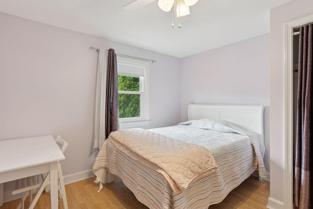 48 Woodside Dr, Kennebunk, ME 04043 - bedroom with light wood-style flooring, baseboards, and ceiling fan