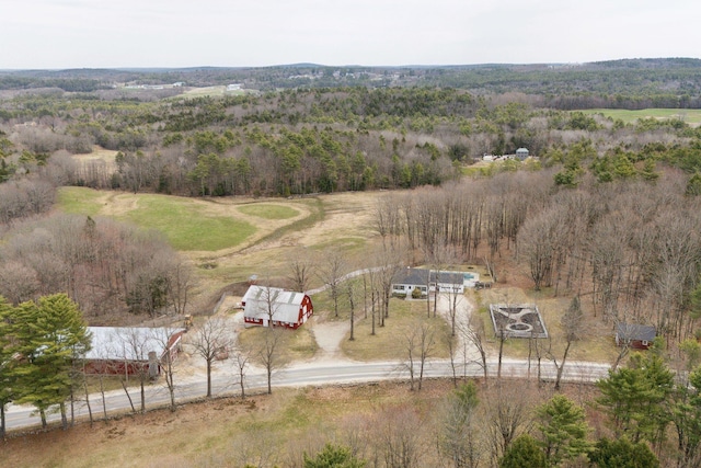 bird's eye view with a rural view and a wooded view