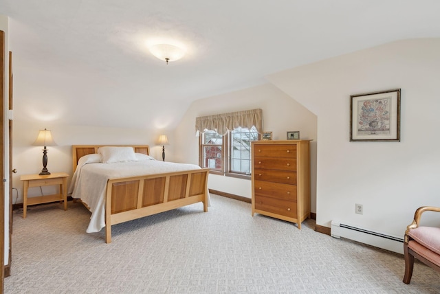 bedroom with light colored carpet, baseboards, vaulted ceiling, and a baseboard radiator