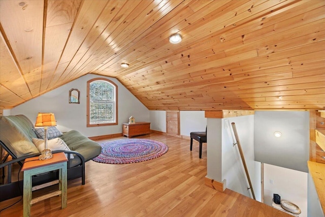 bonus room with baseboards, vaulted ceiling, wooden ceiling, and wood finished floors