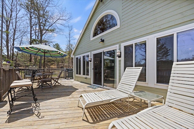 deck with outdoor dining space