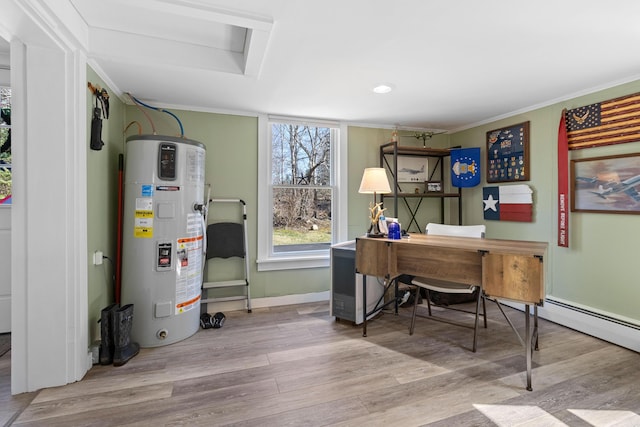 office area featuring water heater, baseboards, ornamental molding, and wood finished floors