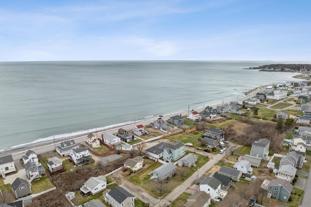 birds eye view of property with a residential view, a view of the beach, and a water view