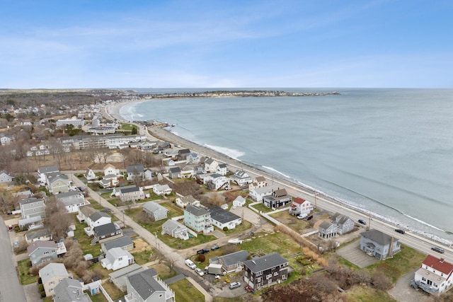 drone / aerial view featuring a water view and a residential view