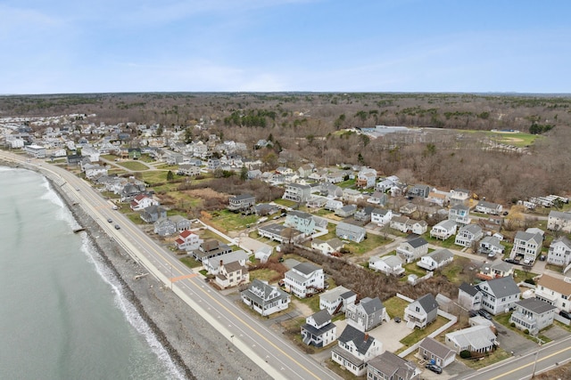 bird's eye view featuring a water view and a residential view