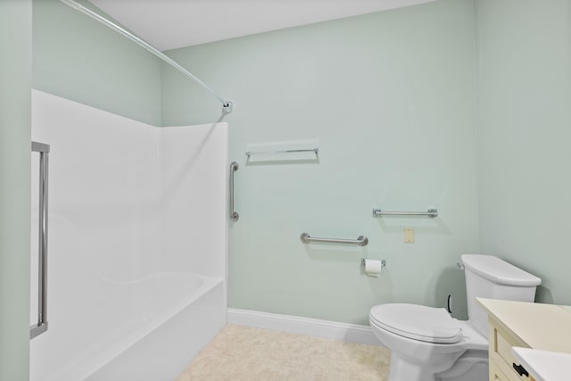 bathroom with toilet, shower / washtub combination, vanity, tile patterned flooring, and baseboards