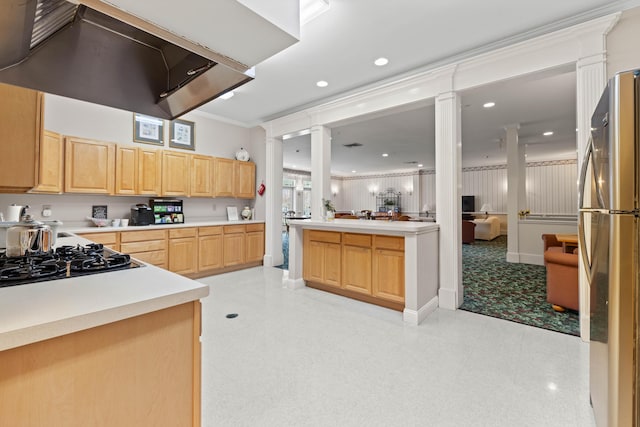 kitchen with light countertops, black gas cooktop, decorative columns, and light brown cabinetry