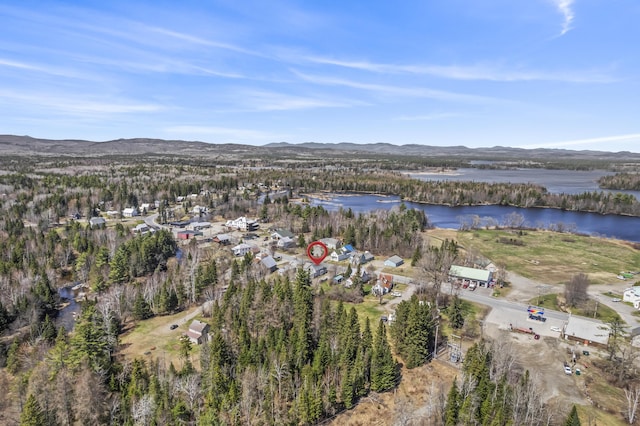 bird's eye view with a water and mountain view