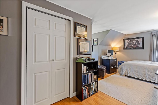 bedroom with light wood finished floors