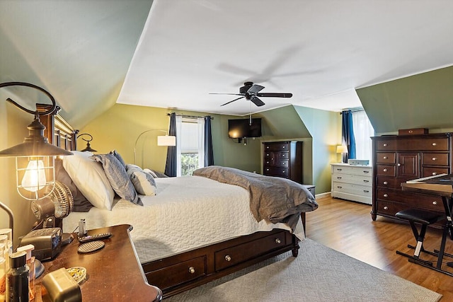 bedroom with ceiling fan and wood finished floors