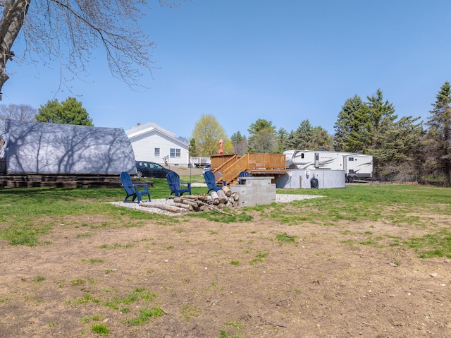 view of yard featuring a deck