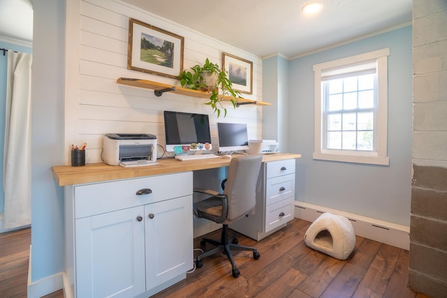 office with dark wood finished floors, baseboards, a baseboard radiator, ornamental molding, and recessed lighting
