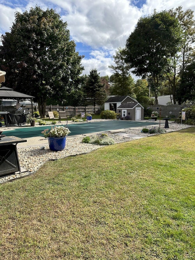 20 Patrick St, Skowhegan, ME 04976 - view of yard featuring an outdoor structure and a storage unit