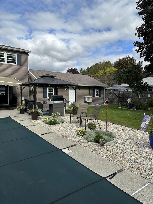 20 Patrick St, Skowhegan, ME 04976 - rear view of property featuring a gazebo and a patio area