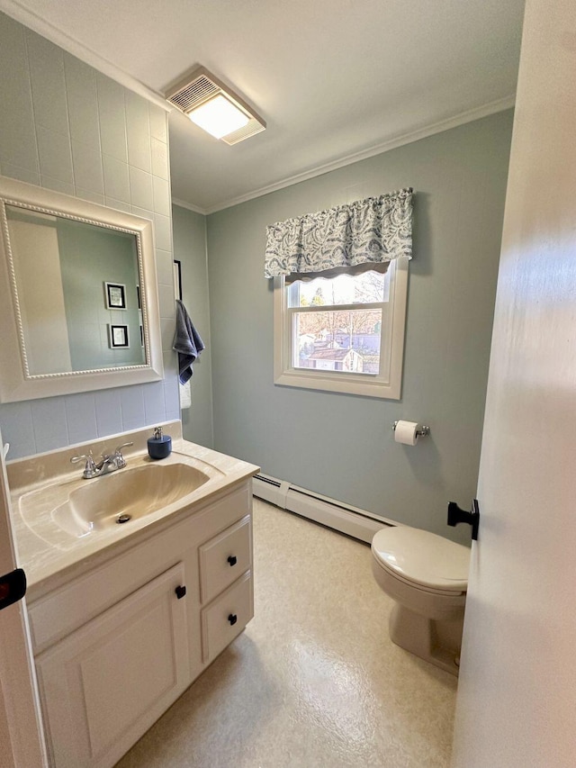 20 Patrick St, Skowhegan, ME 04976 - bathroom with baseboard heating, crown molding, toilet, and vanity