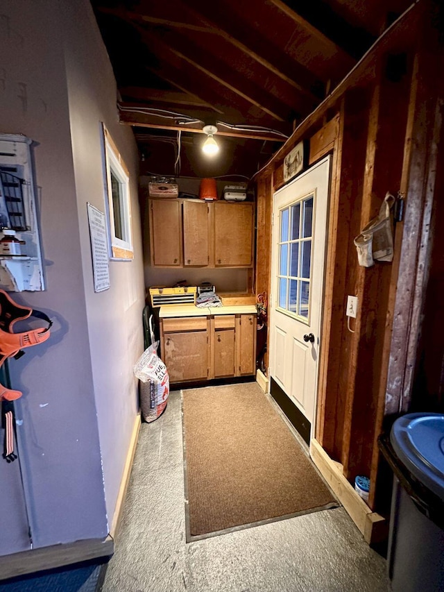 20 Patrick St, Skowhegan, ME 04976 - kitchen with brown cabinetry, light countertops, baseboards, and carpet