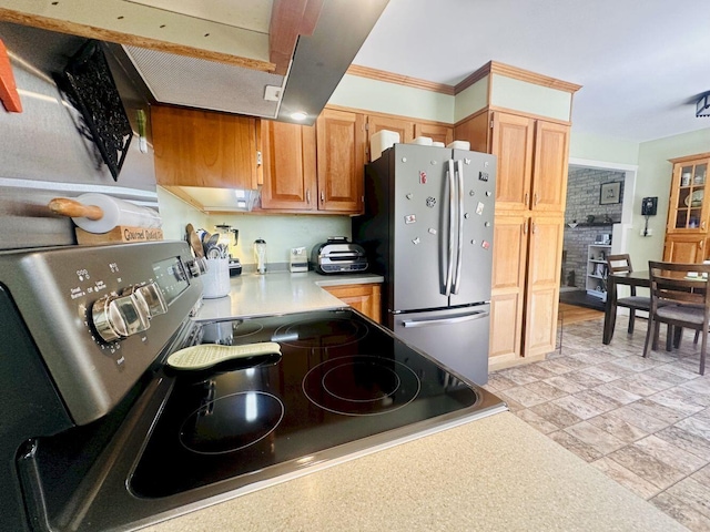 20 Patrick St, Skowhegan, ME 04976 - kitchen with stainless steel appliances, light countertops, and light stone finish floors
