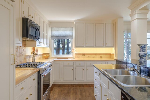 8 Spring Ln, Mount Desert, ME 04660 - kitchen featuring stainless steel range, black microwave, a sink, and white cabinets