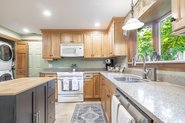 51 Beaver Dam Rd, South Berwick, ME 03908 - kitchen featuring white appliances, stacked washer and clothes dryer, a sink, butcher block counters, and decorative light fixtures