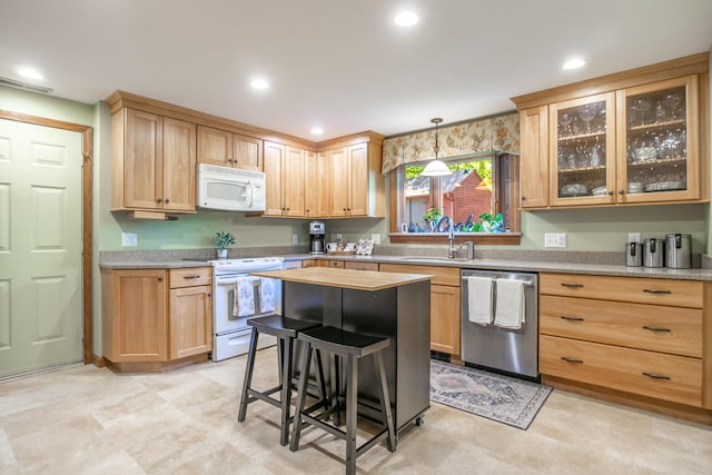 51 Beaver Dam Rd, South Berwick, ME 03908 - kitchen featuring white appliances, a sink, light brown cabinets, glass insert cabinets, and recessed lighting