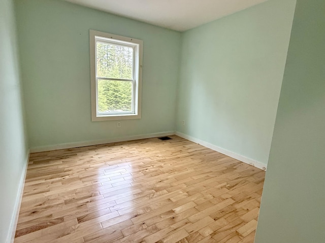 8 Berry Ln, Vinalhaven, ME 04863 - spare room with wood finished floors and baseboards