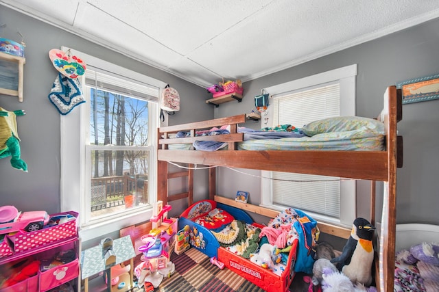 bedroom featuring crown molding