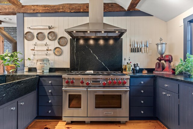 875 N Parish Rd, Turner, ME 04282 - kitchen featuring dark countertops, beam ceiling, light wood-style flooring, and range with two ovens