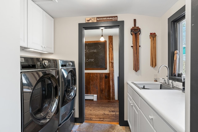 875 N Parish Rd, Turner, ME 04282 - laundry room with a sink, a baseboard radiator, cabinet space, and washing machine and clothes dryer