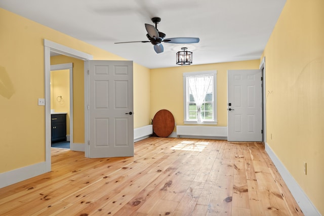 875 N Parish Rd, Turner, ME 04282 - interior space featuring light wood-style floors, baseboards, and a ceiling fan