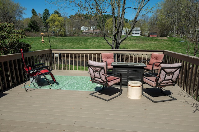 wooden deck with a yard