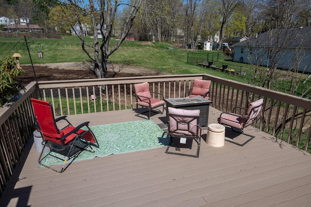 deck featuring a yard