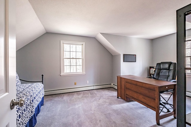 office space featuring carpet flooring, lofted ceiling, and a baseboard heating unit