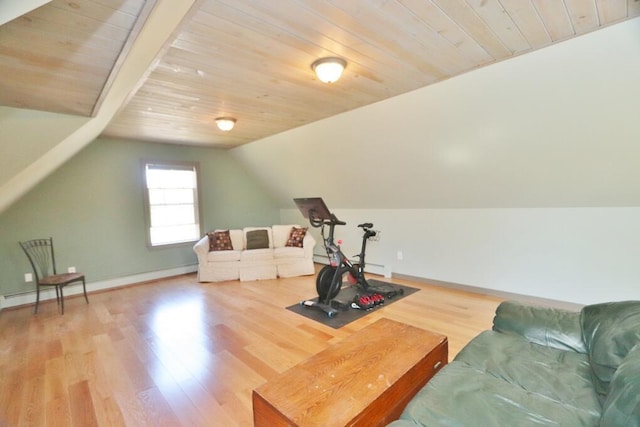 exercise room with wood ceiling, baseboards, vaulted ceiling, and wood finished floors
