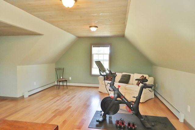 workout room with a baseboard radiator, light wood-style flooring, vaulted ceiling, and wood ceiling