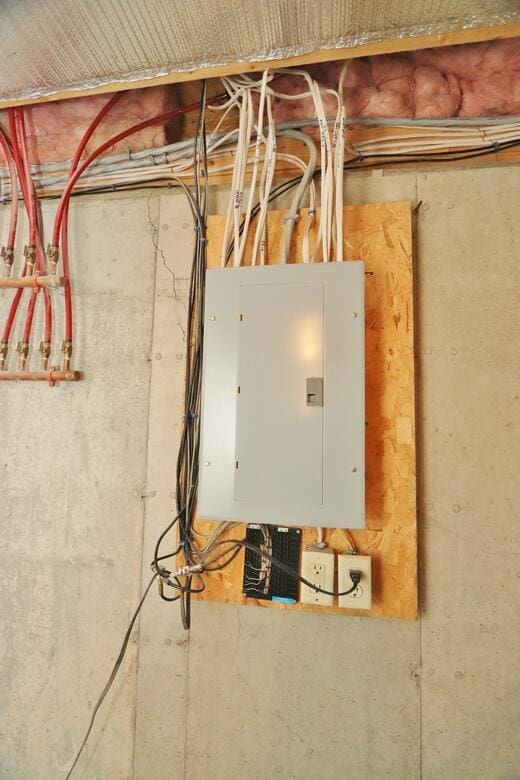 utility room featuring electric panel