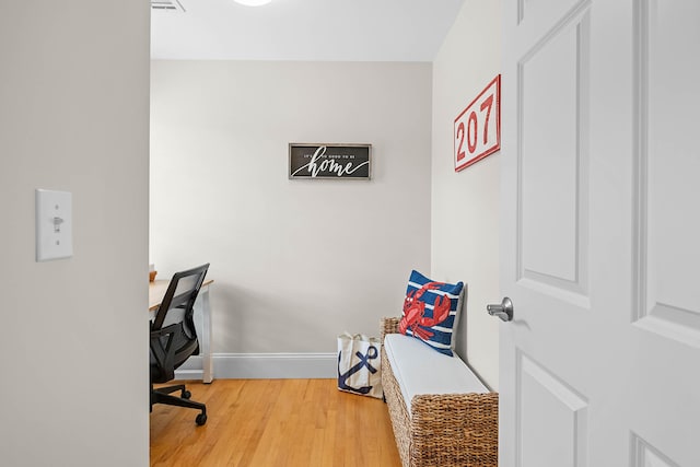 75 Clearwater Dr Unit 305, Falmouth, ME 04105 - home office with baseboards and wood finished floors