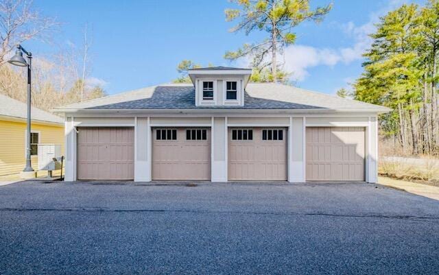 75 Clearwater Dr Unit 305, Falmouth, ME 04105 - view of garage
