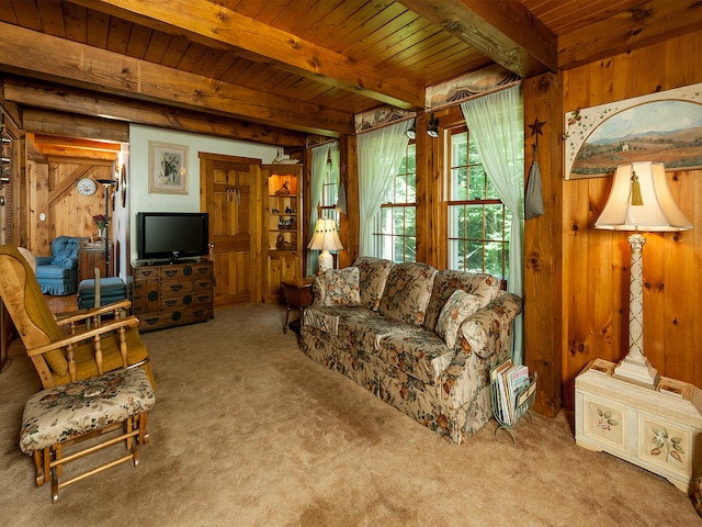living room with carpet, wooden walls, and wood ceiling