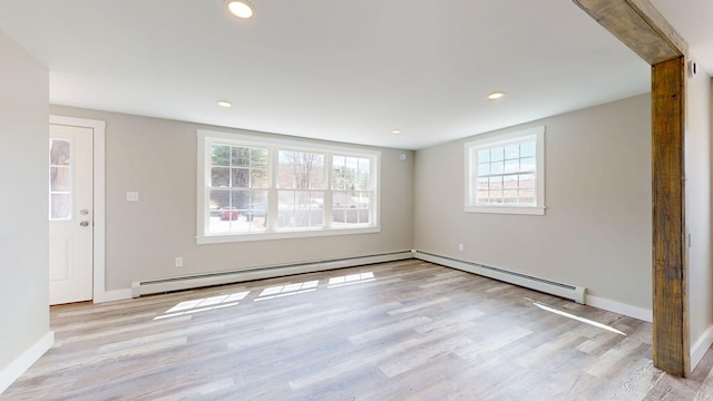 12 Marble Ln, Dixfield, ME 04224 - unfurnished living room featuring light wood finished floors, recessed lighting, a baseboard radiator, and baseboards