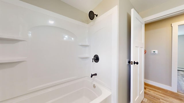 12 Marble Ln, Dixfield, ME 04224 - full bathroom featuring wood finished floors,  shower combination, and baseboards