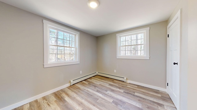 12 Marble Ln, Dixfield, ME 04224 - spare room with light wood finished floors, healthy amount of natural light, and baseboards