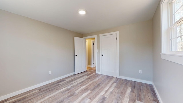 12 Marble Ln, Dixfield, ME 04224 - spare room with light wood-style floors, baseboards, plenty of natural light, and recessed lighting