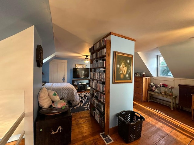 344 Main St, Lincoln, ME 04457 - bedroom with lofted ceiling and hardwood / wood-style floors