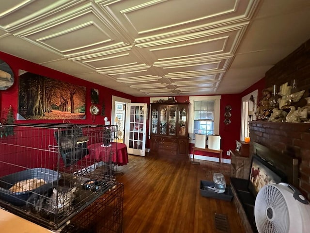 344 Main St, Lincoln, ME 04457 - living room with baseboards, wood finished floors, and a fireplace