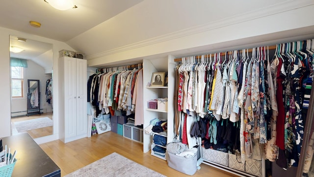 closet featuring a baseboard heating unit