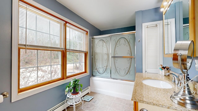 bathroom featuring shower / bath combination with glass door, vanity, and tile patterned floors