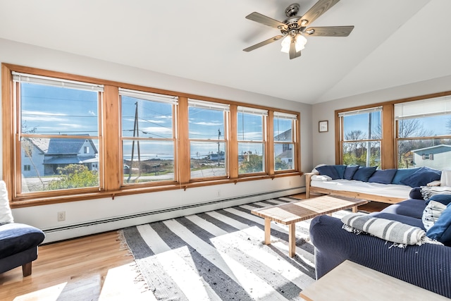 living room with light wood-type flooring, a ceiling fan, a baseboard heating unit, and high vaulted ceiling
